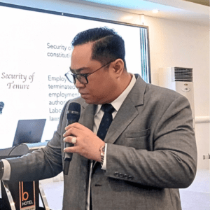 Atty. Alvin Liao Alburo delivering a session on Labor Law Compliance at Luxent Hotel.