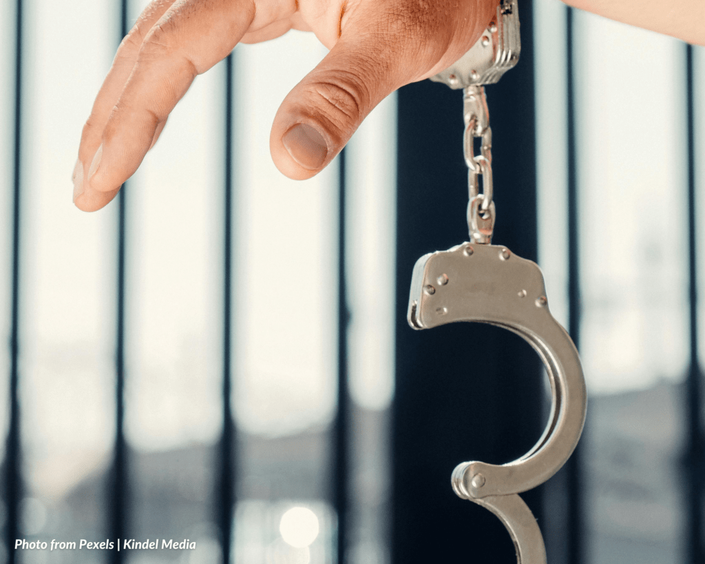 Amnesty as a Mode of Extinction of Criminal Liability, image of a hand with handcuff