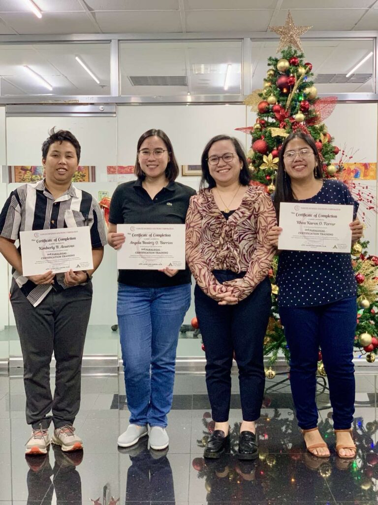 Graduates of the 3rd Paralegal Training by Alburo Law Offices holding their certificates