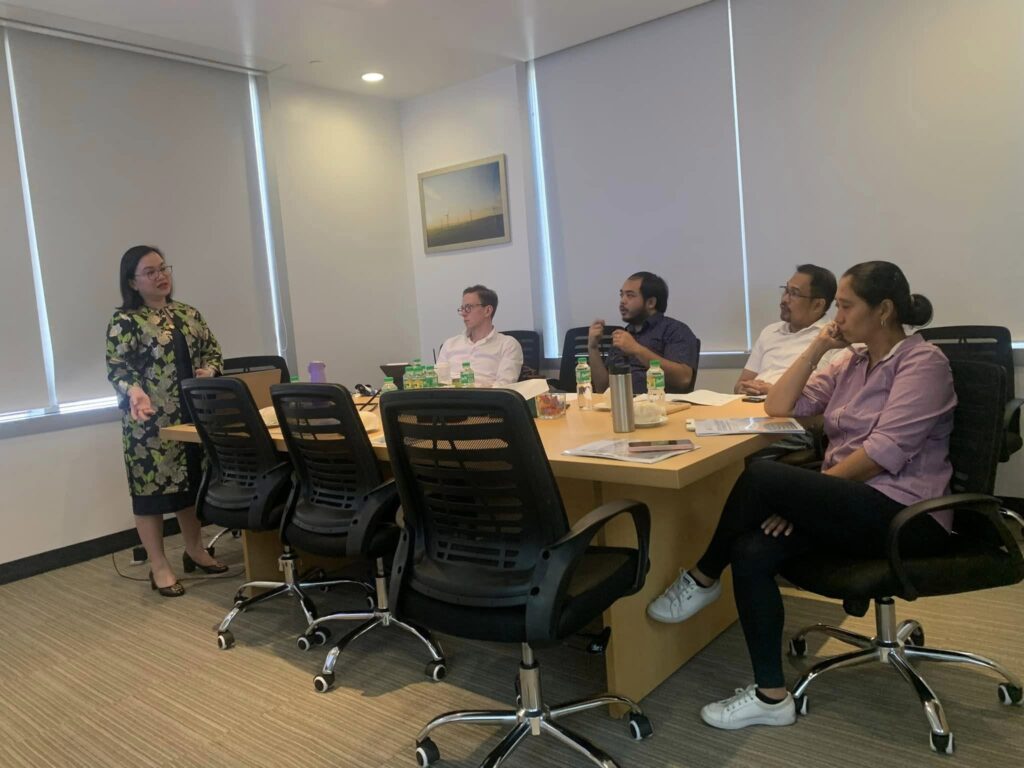 Atty. Rizzle May R. Ostia-Alburo leading an in-house commercial law and labor law session for executives of a multinational energy company