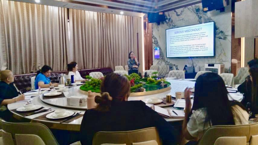 Atty. Rizzle May R. Ostia-Alburo presenting an in-house labor law session to HR staff and executives of a food and beverage company