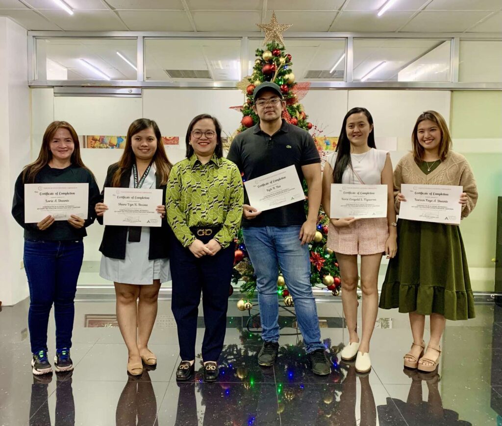 Participants holding certificates after the Contracts in a Legal Nutshell seminar for non-lawyers by Alburo Law Offices